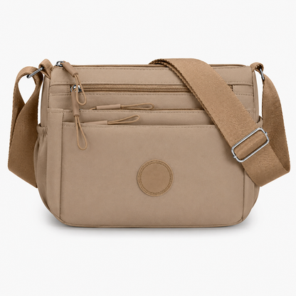 7 Reasons Smart Women Are Ditching Their “Black Hole” Bags for This Genius Multi-Pocket Crossbody