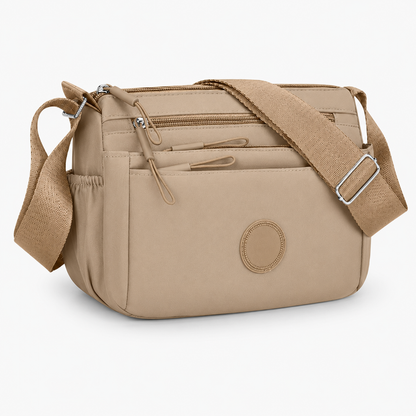 7 Reasons Smart Women Are Ditching Their “Black Hole” Bags for This Genius Multi-Pocket Crossbody