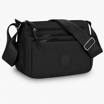 7 Reasons Smart Women Are Ditching Their “Black Hole” Bags for This Genius Multi-Pocket Crossbody